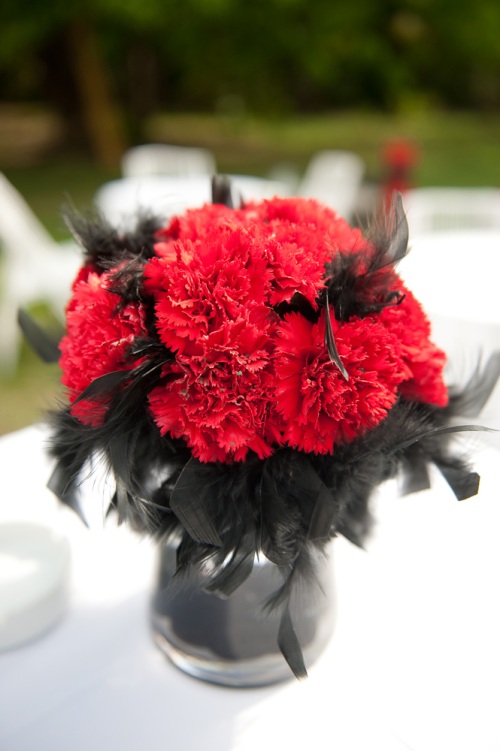 centerpiece with feathers wedding Red Carnations With Black Feather 