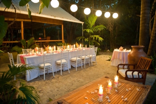 White paper lanterns added an inviting glow to this feast under the stars